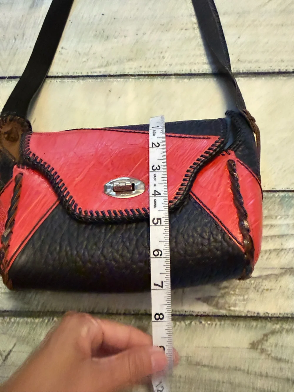 Vintage western leather black and red braided sides fringe shoulder bag purse.